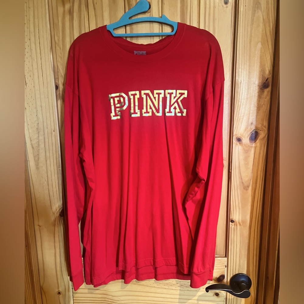 Pink Victoria’s Secret long sleeve shirt red/gold lettering. Large